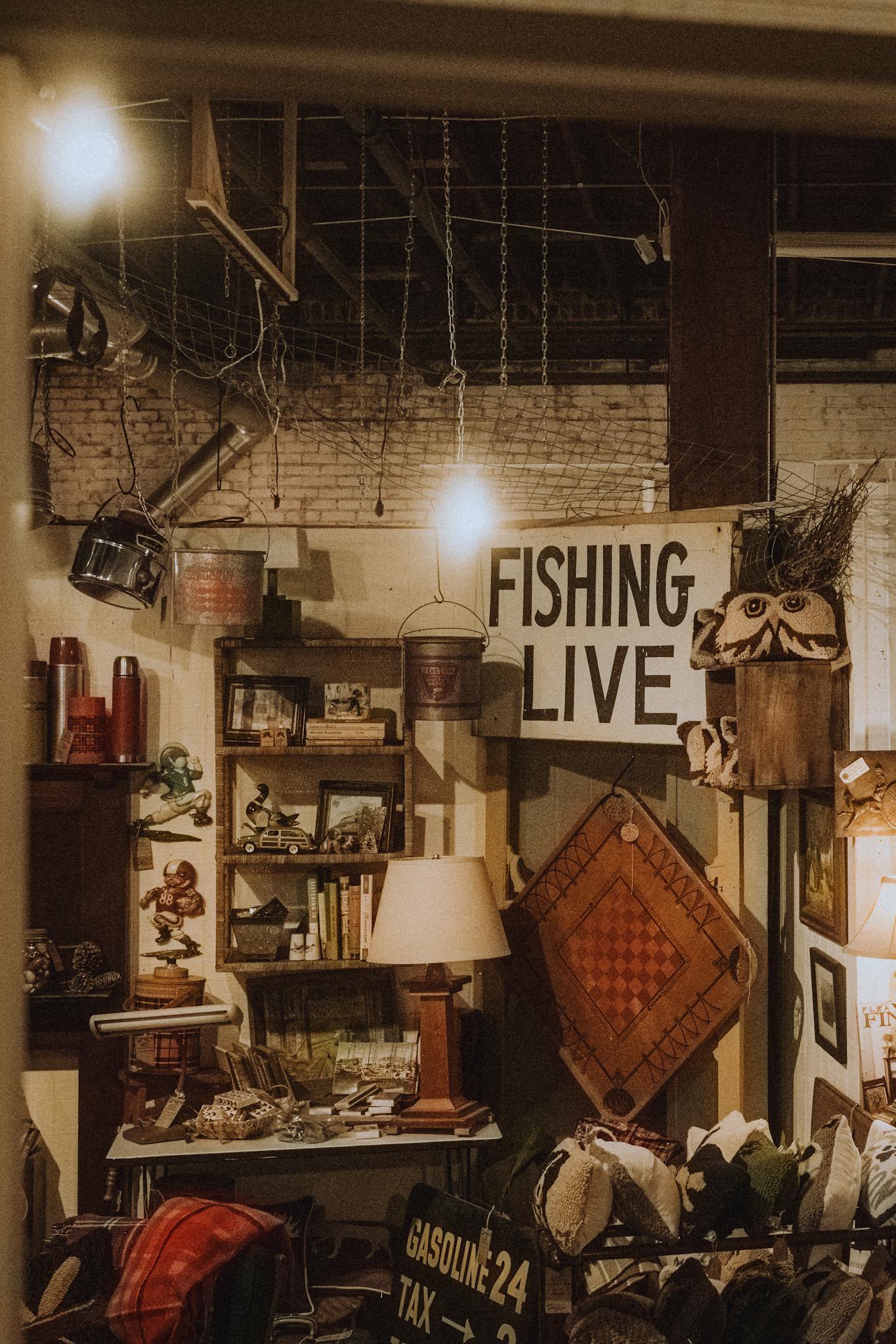 Cozy antique shop interior full of vintage items and decor, evoking a nostalgic atmosphere.